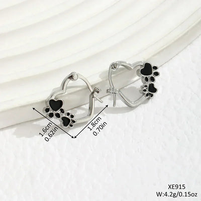 NOVA – Elegante Huggie-Creolen mit Herz & Pfote in Silberoptik und schwarzer Emaille für einen stilvollen Look