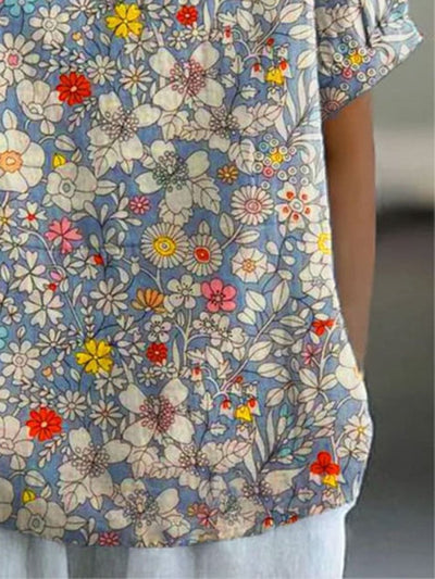 KURZARM-BLUSE MIT BLUMENMUSTER