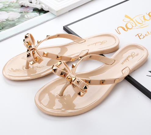 Nikki® | Flip-Flops-Sandalen mit Schleife und Nieten
